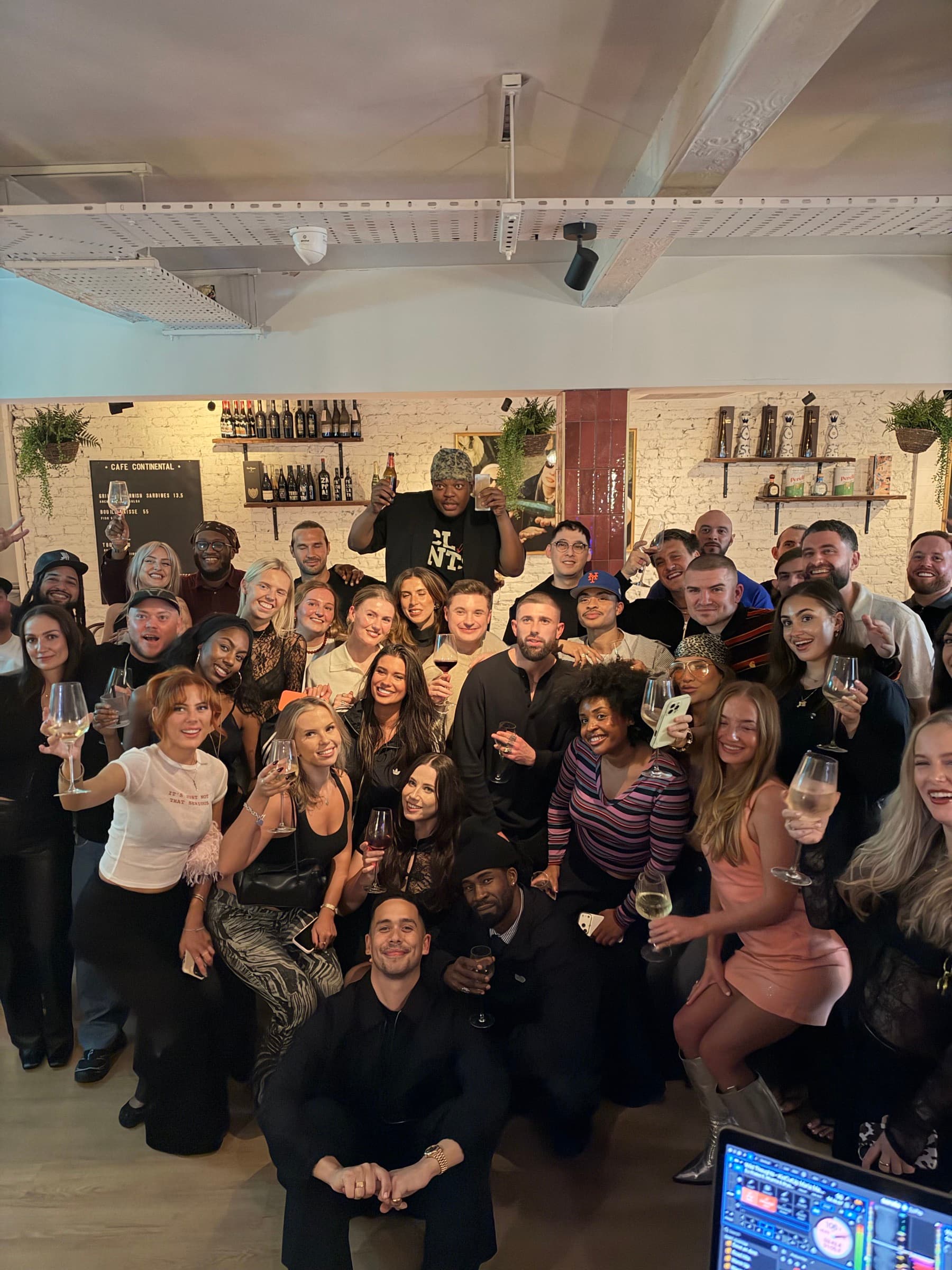 The whole room gathered for a group photograph at the end of MCR 07, glasses raised
